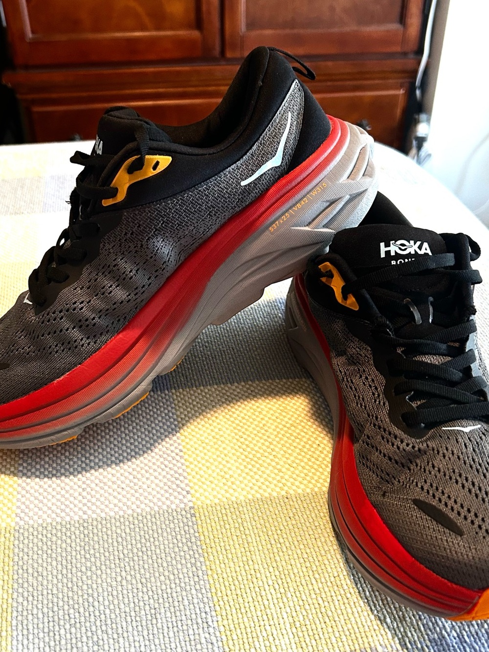 Hoka Men's canvas shoes — Gray, & Black with Red & Yellow Accents size 10